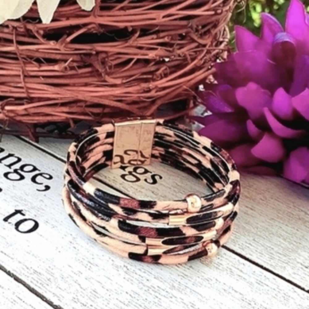 New Cheetah print leather layered, cuff bracelet. Magnetic clasp. Gold accents